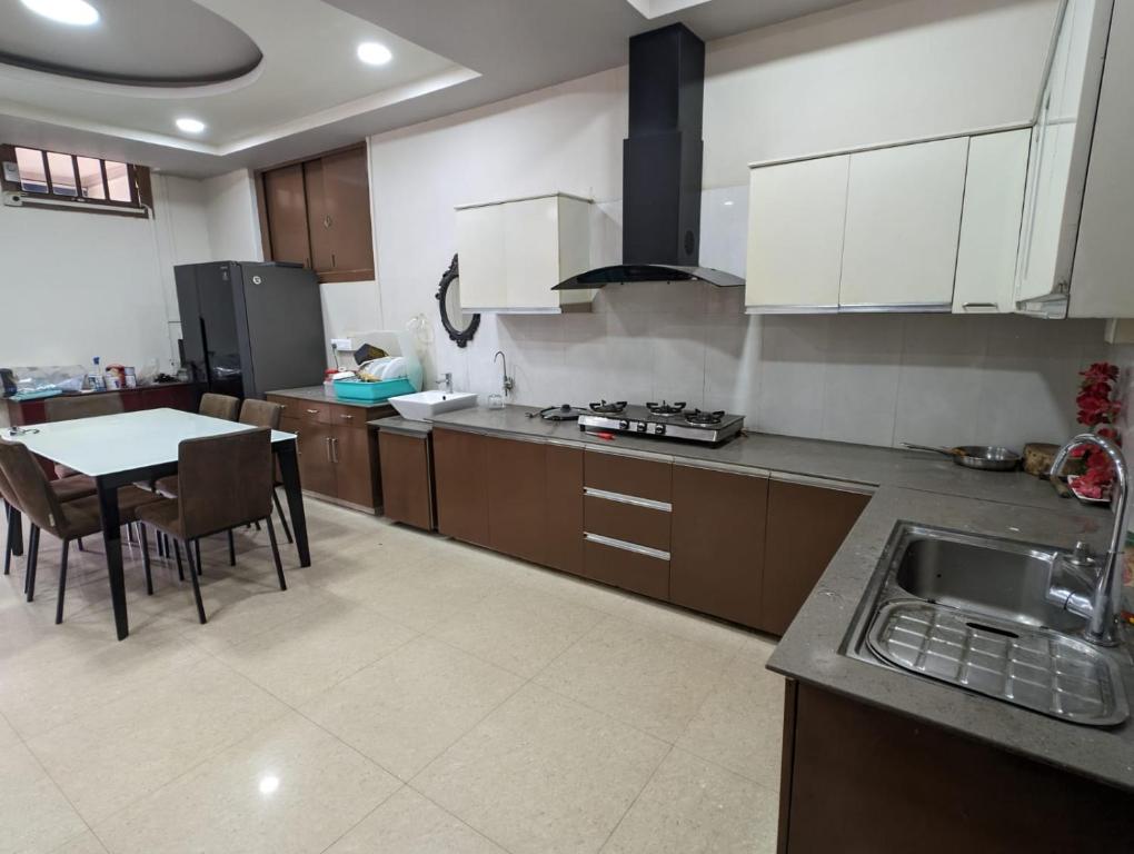 Een keuken of kitchenette bij RT Mutbu