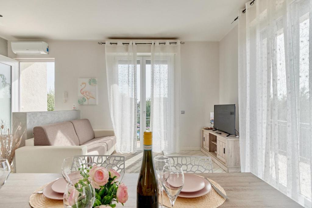 A television and/or entertainment centre at App. Mimosa Minerva Holiday Home