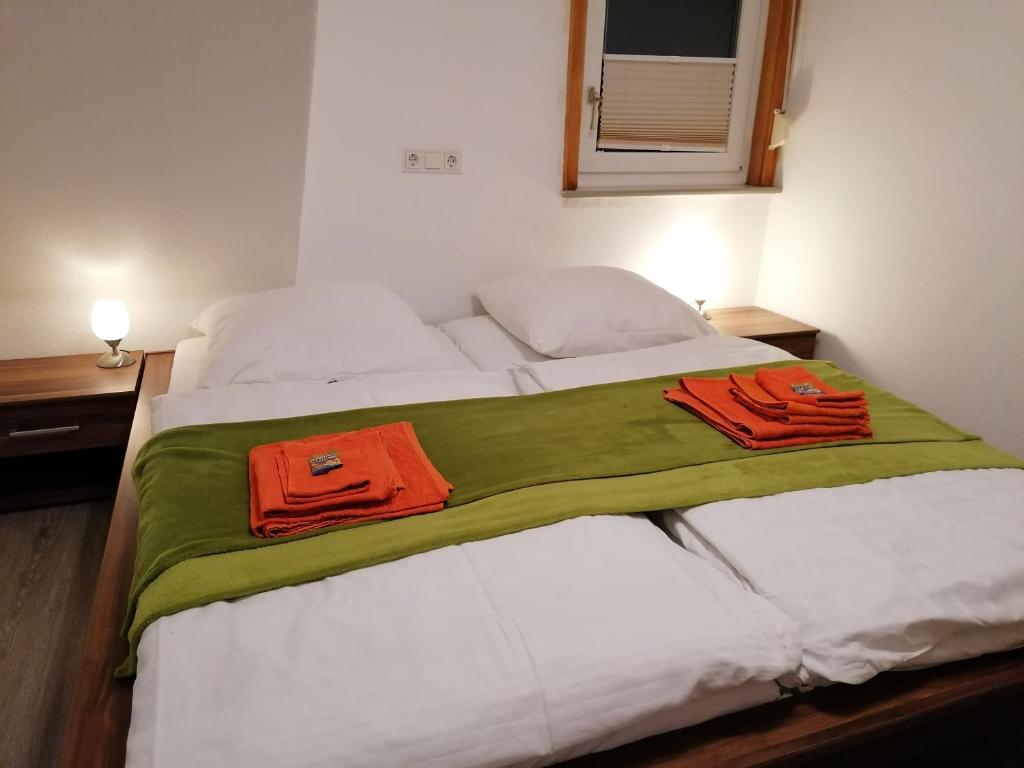 Postel nebo postele na pokoji v ubytování Ferienwohnung (R)Auszeit