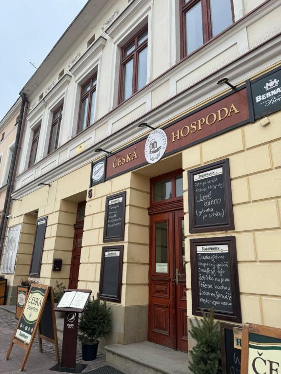 a building with a sign on the front of it at Hostel Va Bank in Rzeszów