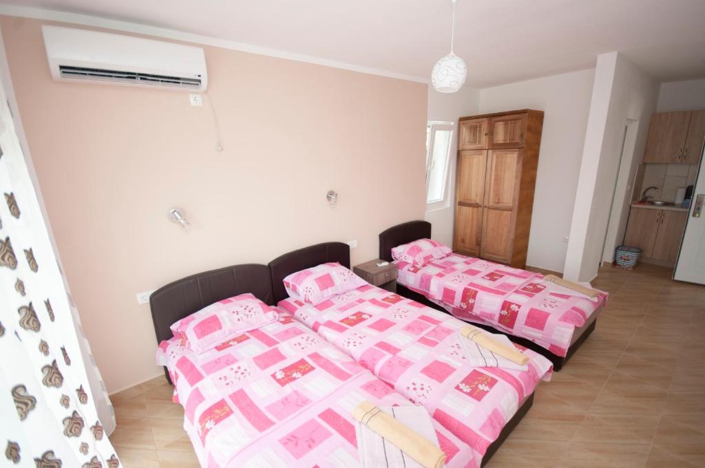Postel nebo postele na pokoji v ubytování Studio Apartments Tea