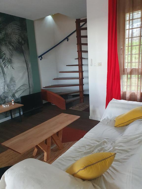 Postel nebo postele na pokoji v ubytování Les Fauvettes