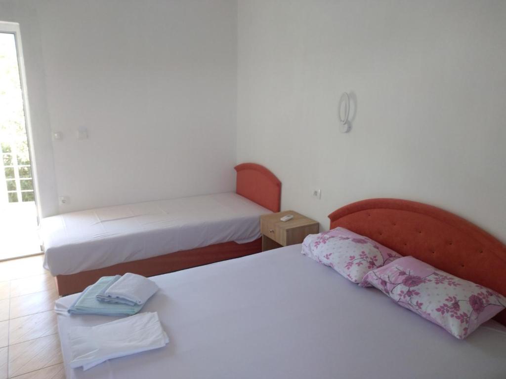 Postel nebo postele na pokoji v ubytování Studio Apartments Tea