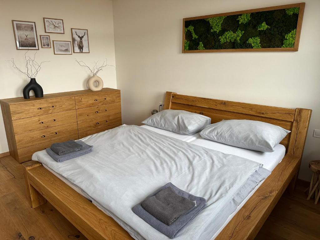 Postel nebo postele na pokoji v ubytování Strunzova pila - wellness