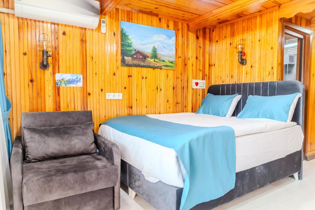 Postel nebo postele na pokoji v ubytování Palladium APART Hotel