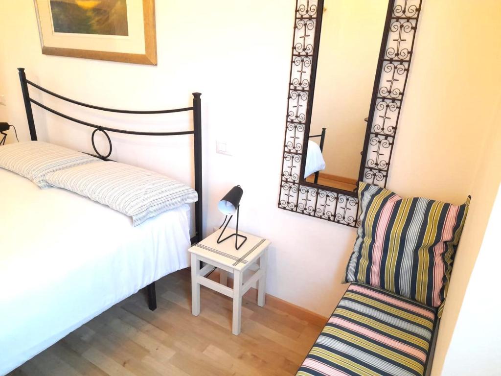 Postel nebo postele na pokoji v ubytování Appartamento Palma