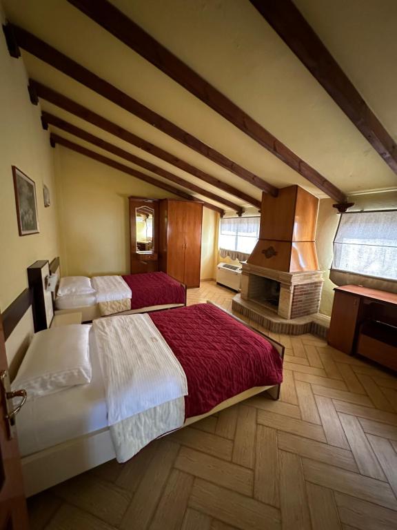 Кровать или кровати в номере New Hotel Leone