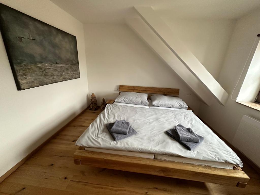 Postel nebo postele na pokoji v ubytování Strunzova pila - wellness