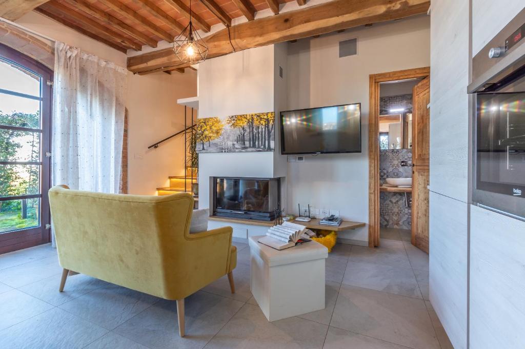 TV a/nebo společenská místnost v ubytování Sunflower con vista su Siena