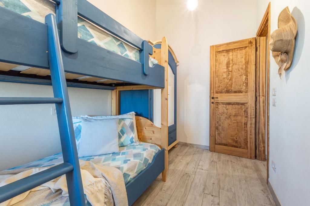 Postel nebo postele na pokoji v ubytování Sunflower con vista su Siena
