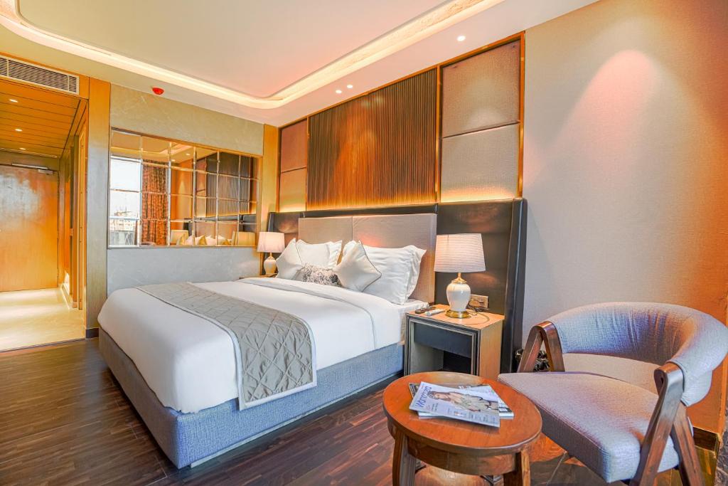 Postel nebo postele na pokoji v ubytování Hotel Levelup Signature