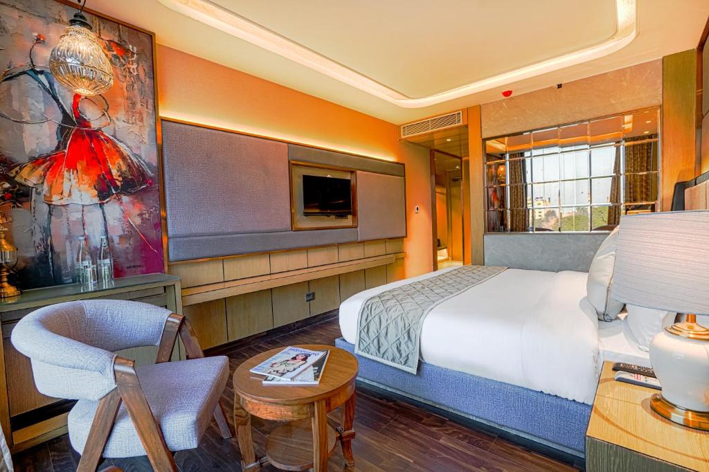 Postel nebo postele na pokoji v ubytování Hotel Levelup Signature