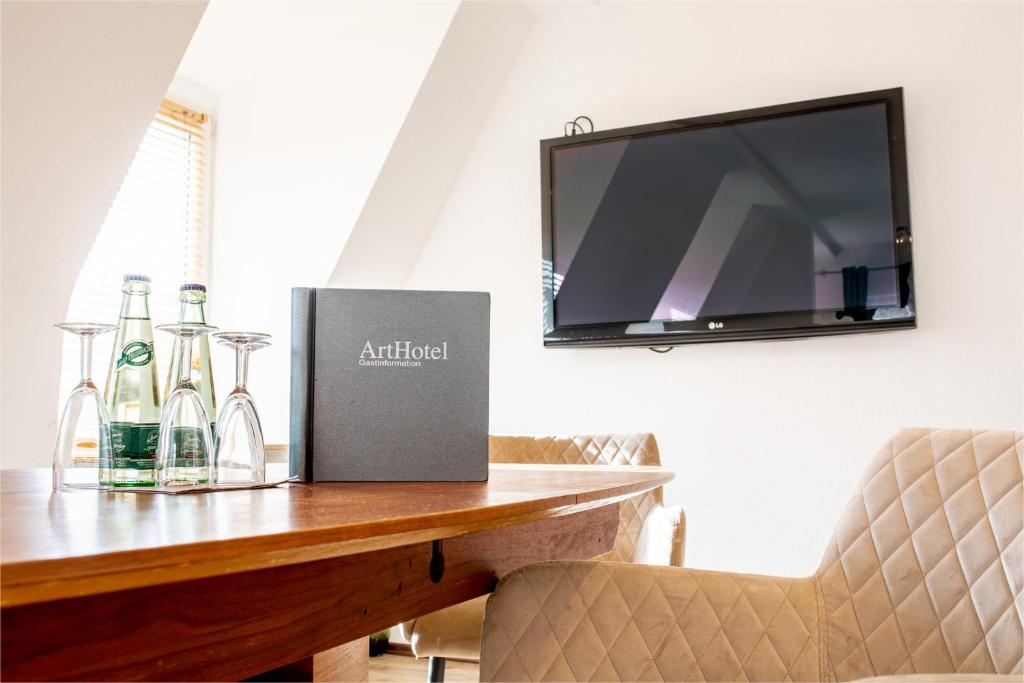 TV a/nebo společenská místnost v ubytování ArtHotel City