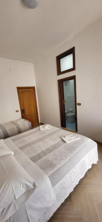 Postel nebo postele na pokoji v ubytování Da Carlino