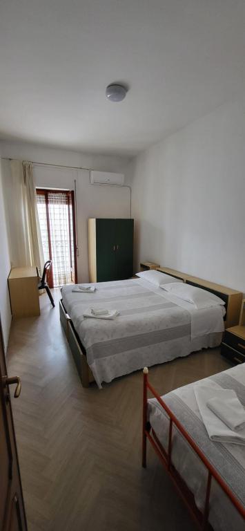 Postel nebo postele na pokoji v ubytování Da Carlino