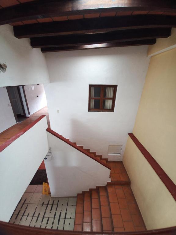 a view from the top of the stairs of a house at Hotel Paraíso de San Sebastián Jalisco in San Sebastián del Oeste