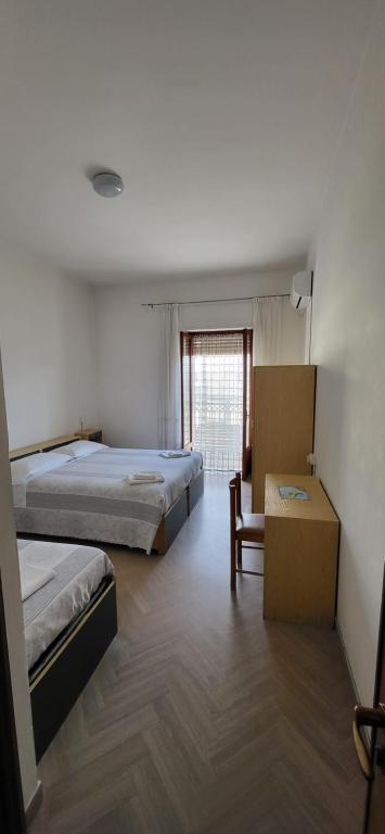 Postel nebo postele na pokoji v ubytování Da Carlino
