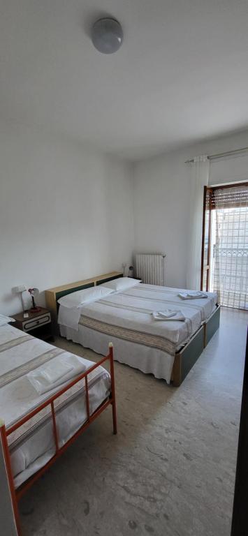 Postel nebo postele na pokoji v ubytování Da Carlino