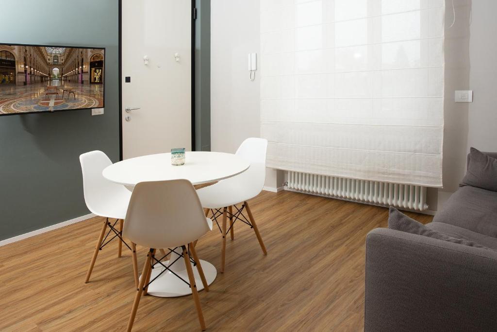 Posezení v ubytování flat at Fiera near metro and easy parking, with terrace and garden