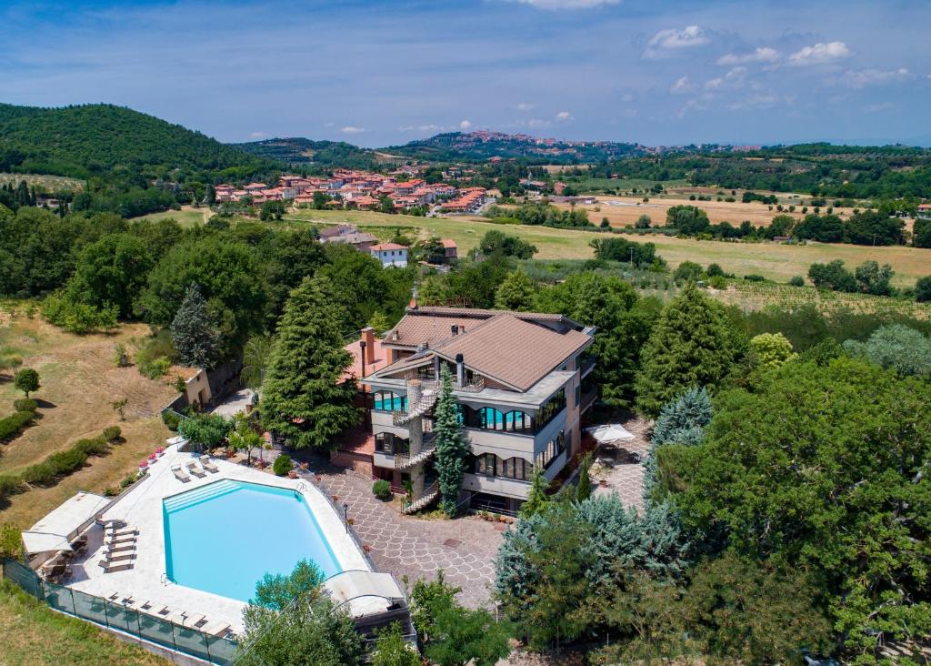 an aerial view of a house with a swimming pool at Villa Ambra in Sant'Albino