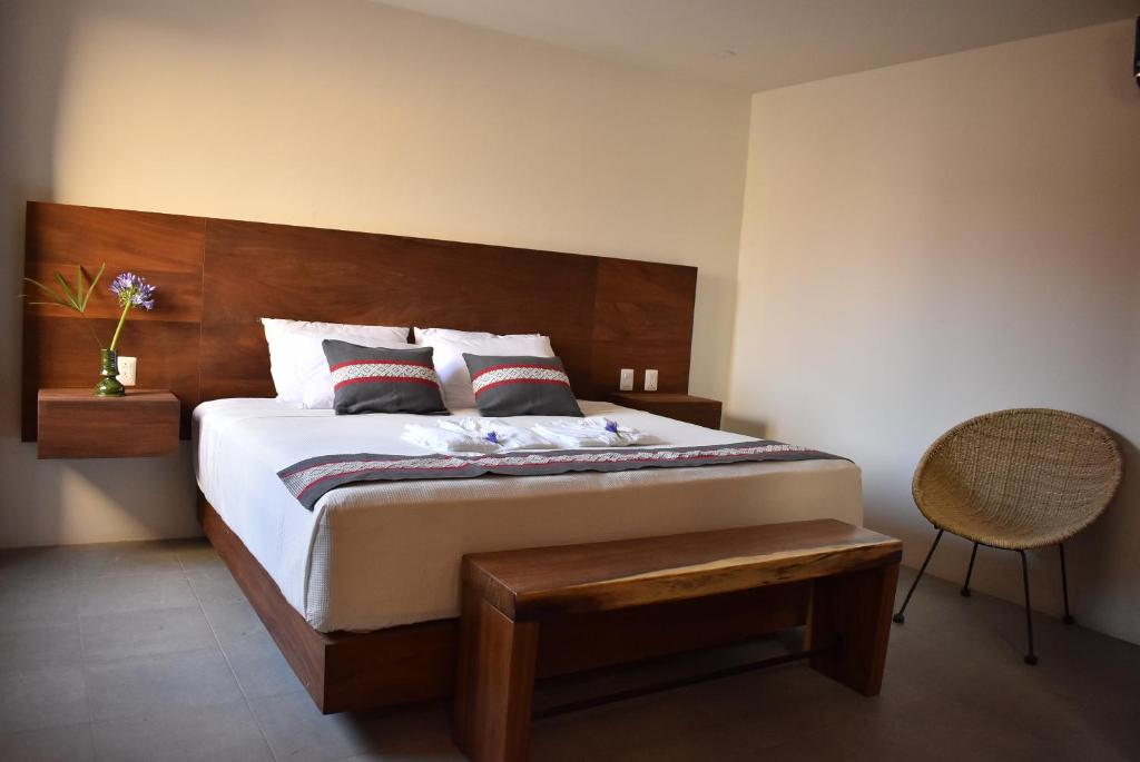 Postel nebo postele na pokoji v ubytování Punta Agave Suites