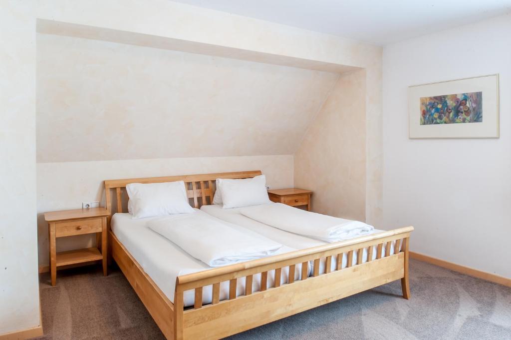 Postel nebo postele na pokoji v ubytování Gästehaus Brugger