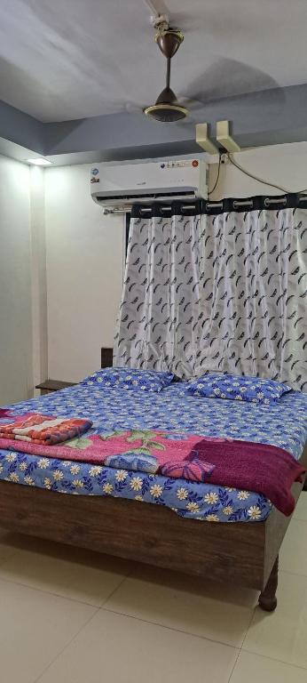 מיטה או מיטות בחדר ב-Rudra house 2