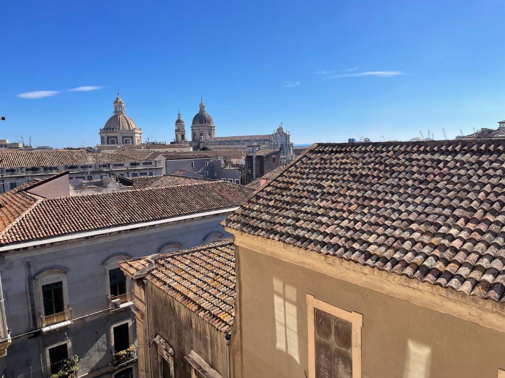 a view of roofs of buildings in a city at Casa Flos31 in Catania