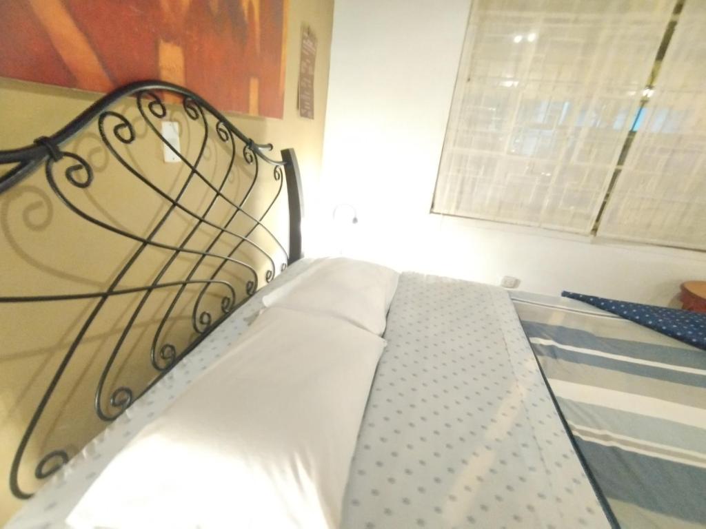 Postel nebo postele na pokoji v ubytování Hospedaje A Verde
