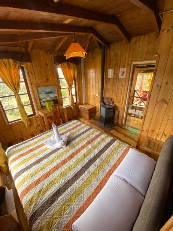 Postel nebo postele na pokoji v ubytování Hostería Chukirawa