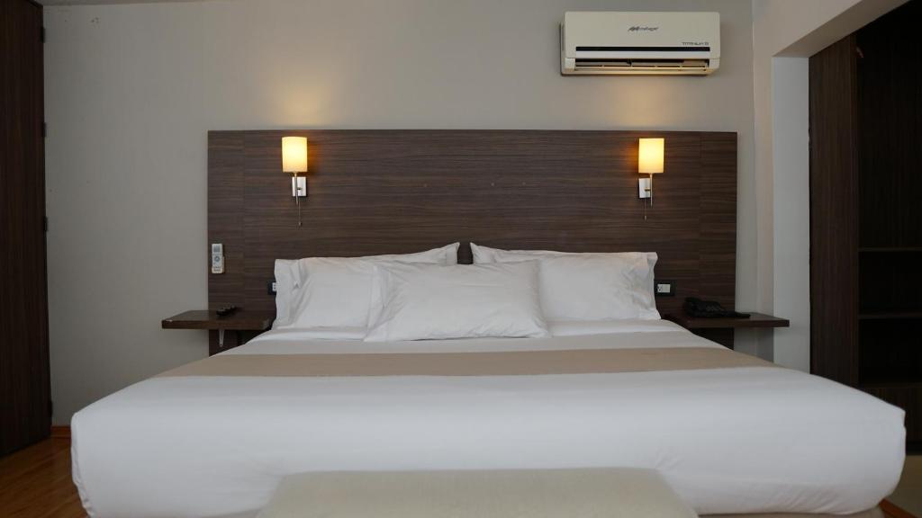 Postel nebo postele na pokoji v ubytování El Hotel Business Class - Zamora Centro
