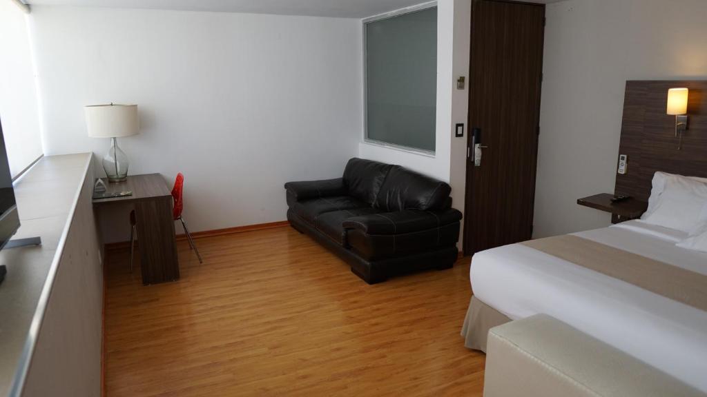 Postel nebo postele na pokoji v ubytování El Hotel Business Class - Zamora Centro