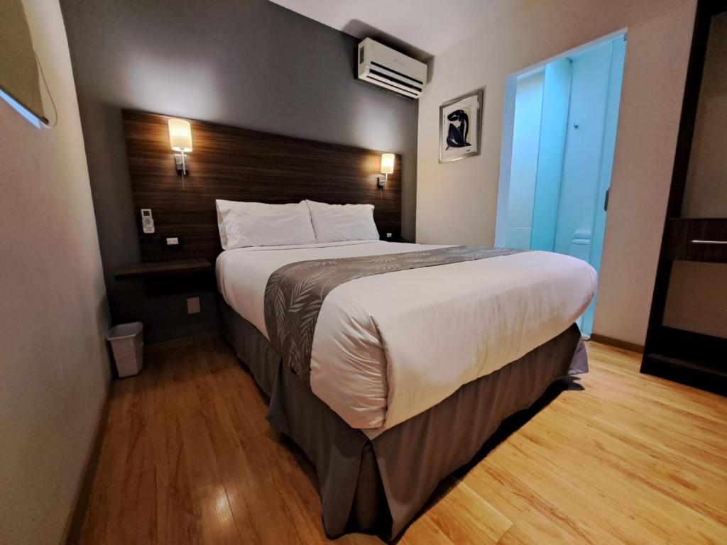 Postel nebo postele na pokoji v ubytování El Hotel Business Class - Zamora Centro