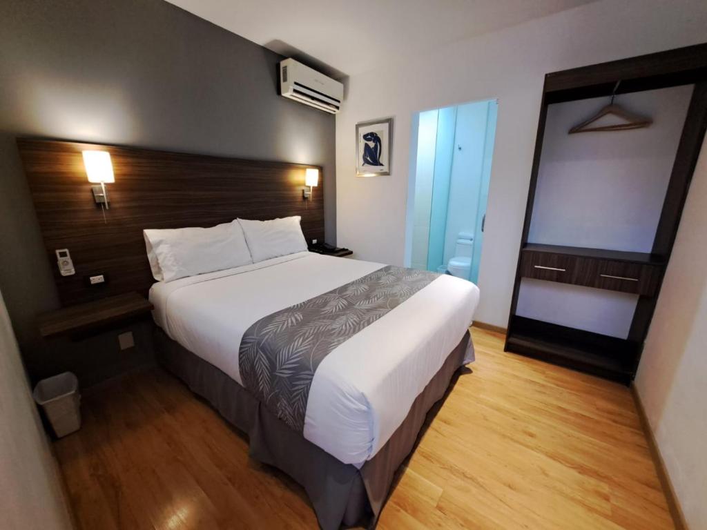 Postel nebo postele na pokoji v ubytování El Hotel Business Class - Zamora Centro
