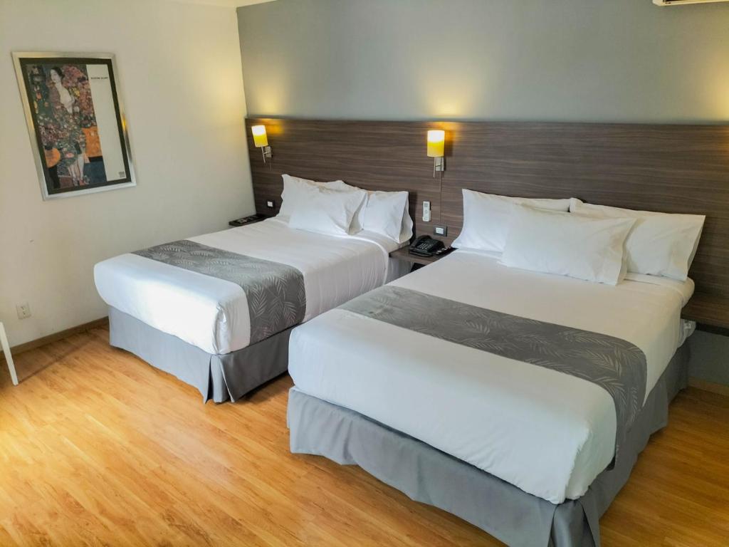 Postel nebo postele na pokoji v ubytování El Hotel Business Class - Zamora Centro