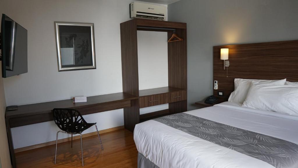 Postel nebo postele na pokoji v ubytování El Hotel Business Class - Zamora Centro