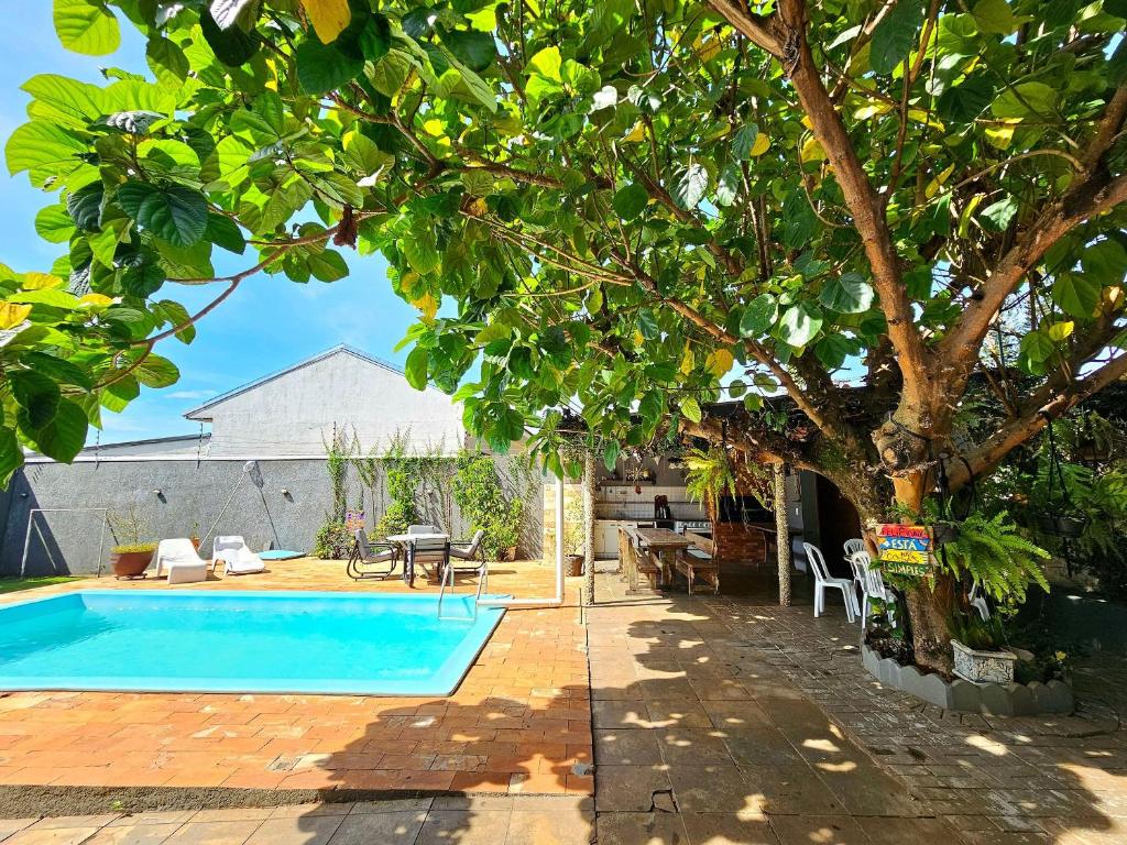 Bazén v ubytování Casa Familiar 4 quartos Piscina região Central Foz nebo v jeho okolí