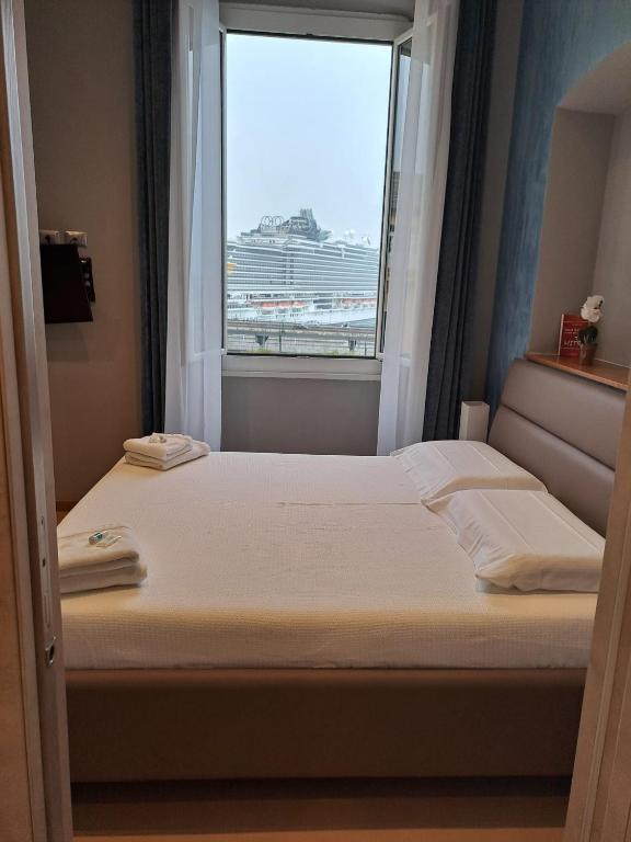 Letto o letti in una camera di Affittacamere Gioiello