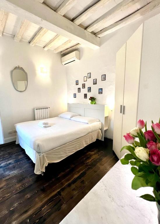 A bed or beds in a room at Agnolo