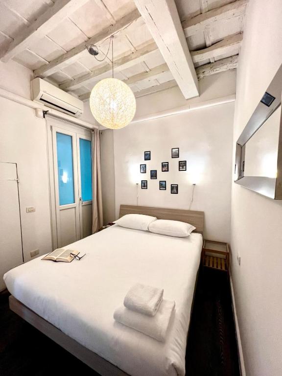 A bed or beds in a room at Agnolo