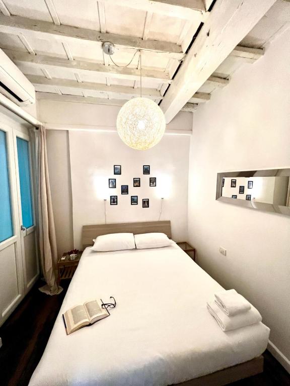 A bed or beds in a room at Agnolo