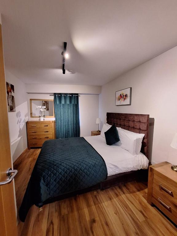 Posteľ alebo postele v izbe v ubytovaní Five Lamps Suites