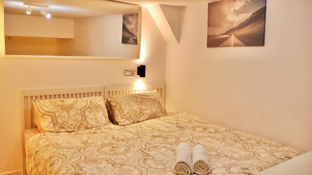 En eller flere senger på et rom på Duplex La Latina Centro Madrid