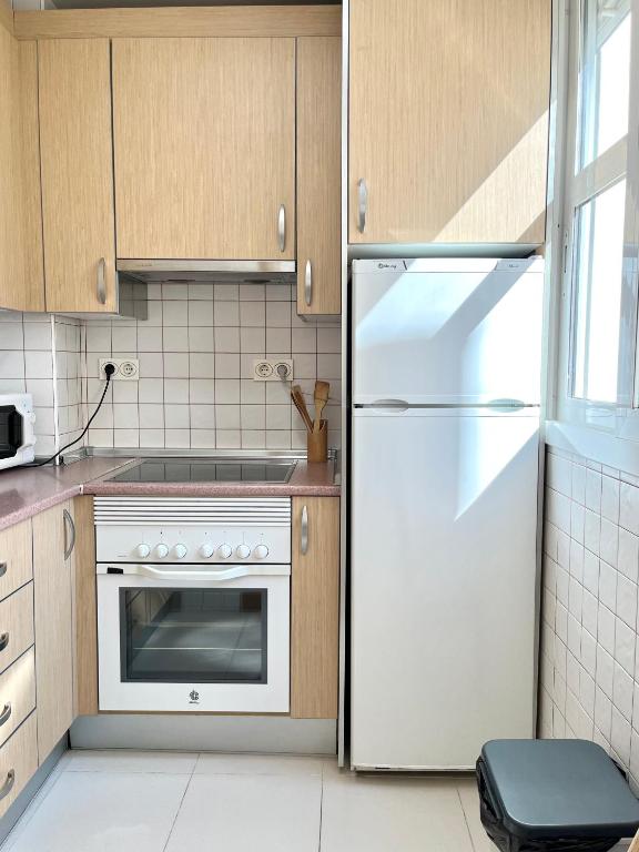 Kuchyň nebo kuchyňský kout v ubytování Apartamento San Juan 3