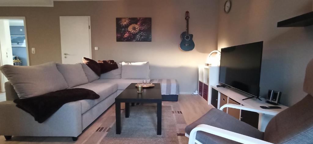 Телевизор и/или развлекательный центр в Sonnenplatz an der Weser I Nähe HDZ I Bali Therme I Kurpark I GOP