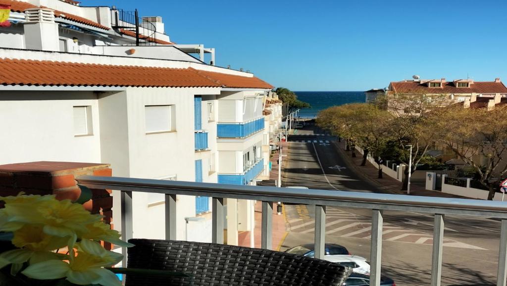a balcony with a view of a street at ApartiaBeach Apartamentos in Alcossebre