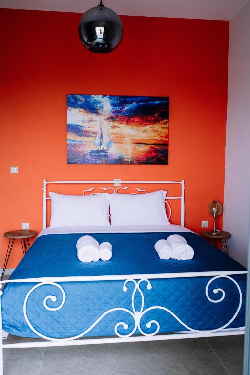 Łóżko lub łóżka w pokoju w obiekcie Konatsi Luxury Apartments