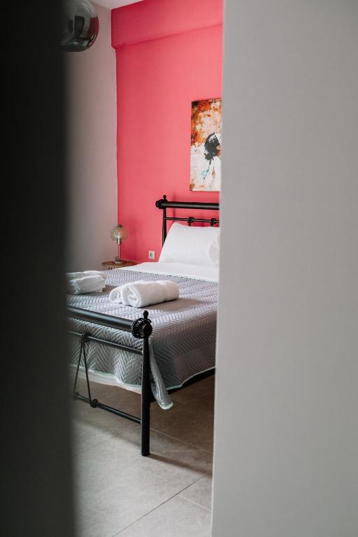 Łóżko lub łóżka w pokoju w obiekcie Konatsi Luxury Apartments