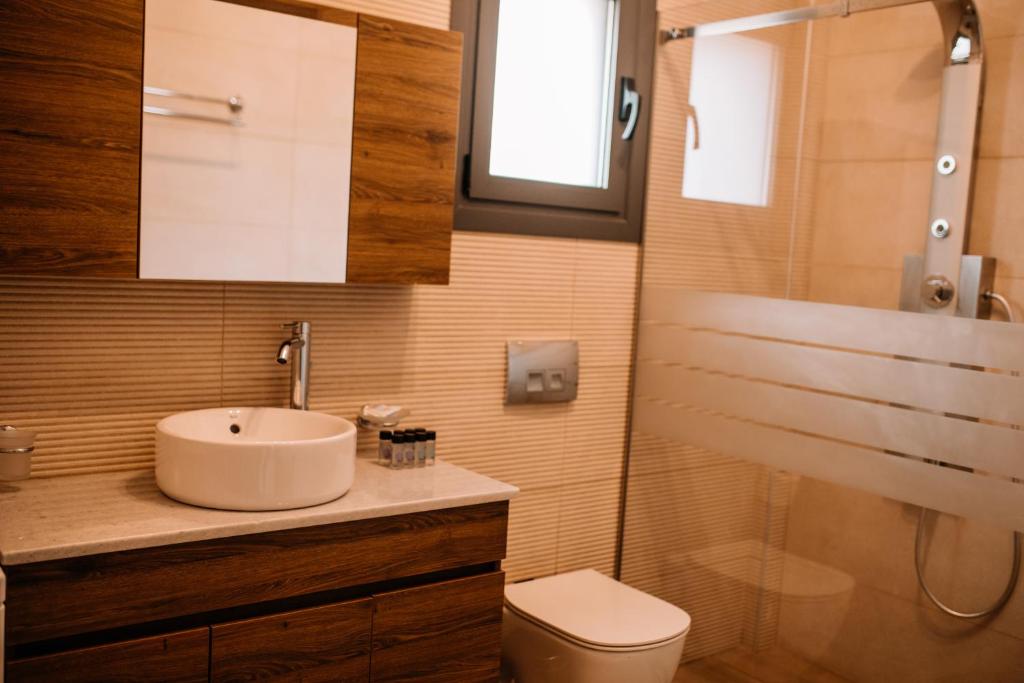 Łazienka w obiekcie Konatsi Luxury Apartments