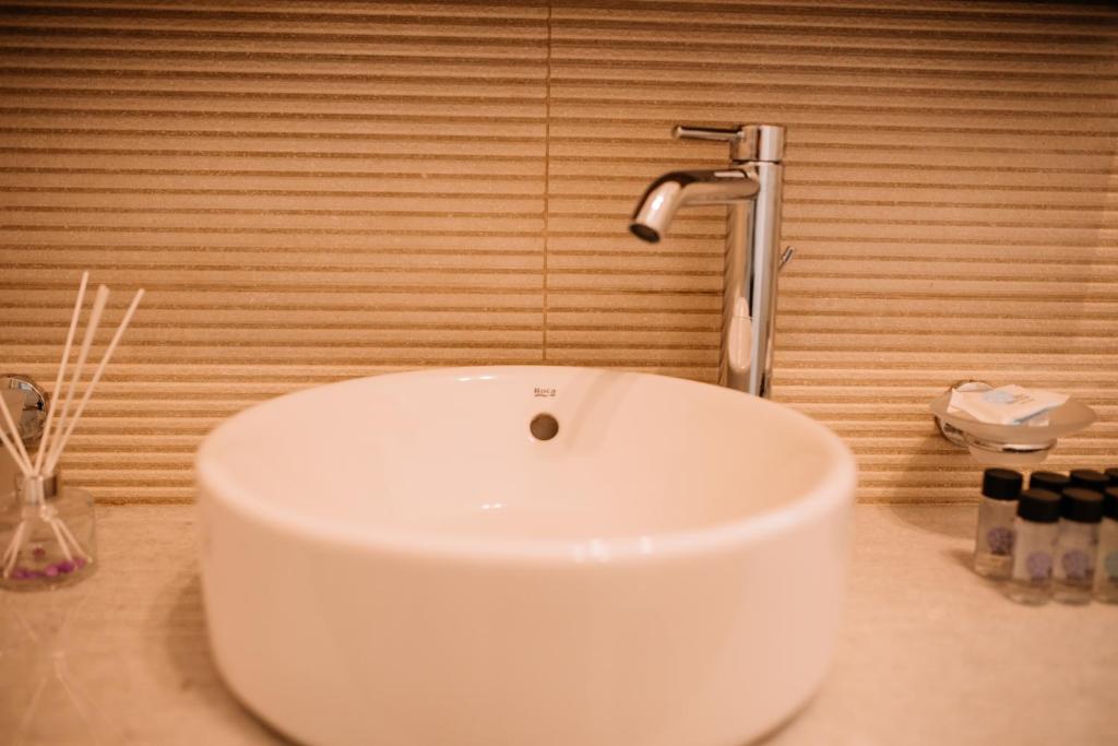 Łazienka w obiekcie Konatsi Luxury Apartments